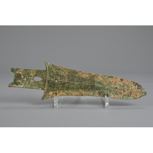 213 - A CHINESE ARCHAIC BRONZE DAGGER AXE, GE. Decorated with taotie mask to each side. Possibly Western Z... 
