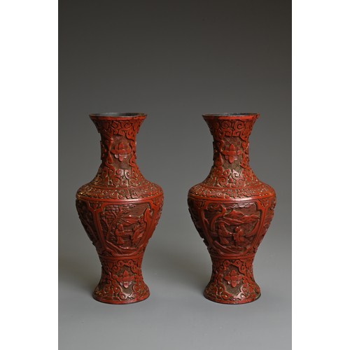 4 - A PAIR OF CHINESE CINNABAR LACQUER VASES, QING DYNASTY. Each of baluster form carved in relief with ... 