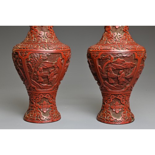 4 - A PAIR OF CHINESE CINNABAR LACQUER VASES, QING DYNASTY. Each of baluster form carved in relief with ... 