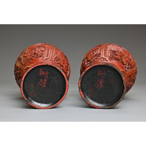 4 - A PAIR OF CHINESE CINNABAR LACQUER VASES, QING DYNASTY. Each of baluster form carved in relief with ... 