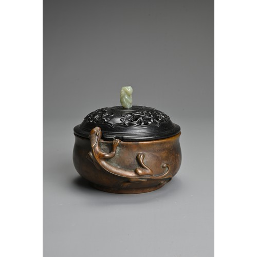 6 - A CHINESE BRONZE CENSER. Heavily cast of rounded form with figure of chilong and two character mark ... 