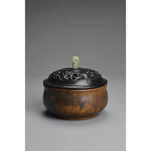 6 - A CHINESE BRONZE CENSER. Heavily cast of rounded form with figure of chilong and two character mark ... 