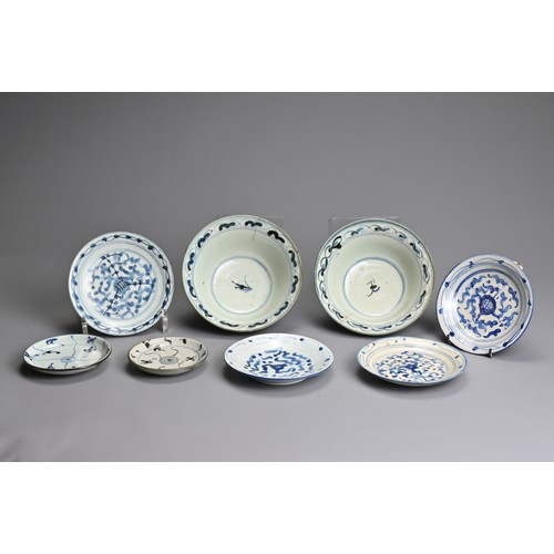 23 - A GROUP OF CHINESE BLUE AND WHITE PORCELAIN ITEMS, 19TH CENTURY. 'Kitchen Qing' porcelain to include... 