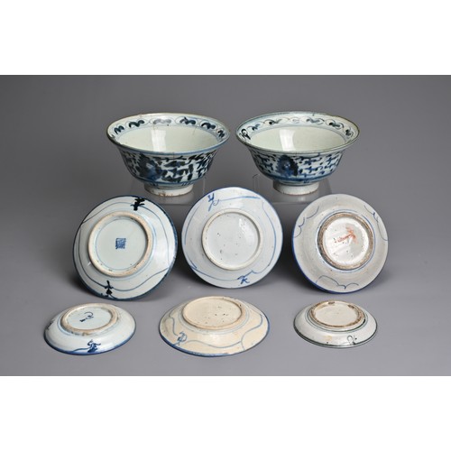 23 - A GROUP OF CHINESE BLUE AND WHITE PORCELAIN ITEMS, 19TH CENTURY. 'Kitchen Qing' porcelain to include... 