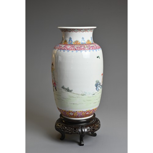 31 - A CHINESE FAMILLE ROSE PORCELAIN LANTERN VASE, REPUBLIC PERIOD. Enamel decorated featuring eight fig... 