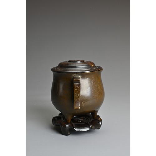 46 - A CHINESE SILVER INLAID BRONZE TRIPOD CENSER, SHISOU MARK, QING DYNASTY. Depicting figures of Qilin ... 