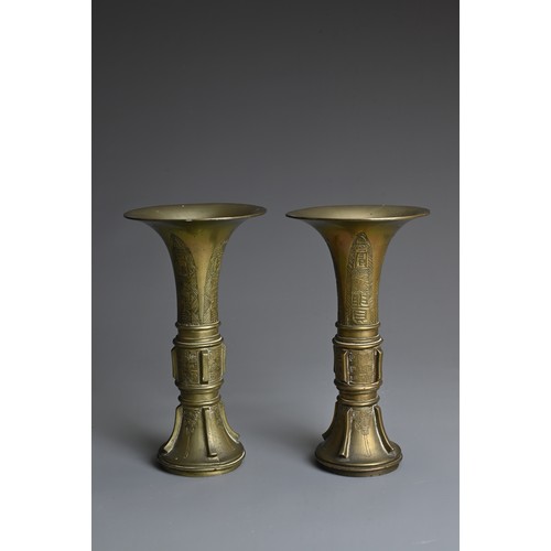 48 - A PAIR OF CHINESE POLISHED BRONZE GU SHAPED VASES, 19/20TH CENTURY. Archaic style decoration with fl... 