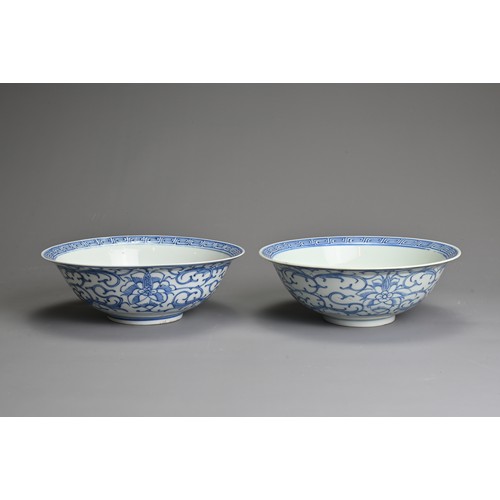 9 - TWO CHINESE BLUE AND WHITE PORCELAIN BOWLS, 19TH CENTURY. Rounded bowls with everted rims decorated ... 