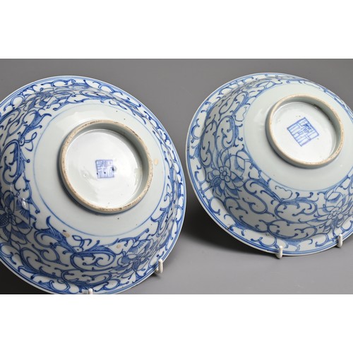 9 - TWO CHINESE BLUE AND WHITE PORCELAIN BOWLS, 19TH CENTURY. Rounded bowls with everted rims decorated ... 