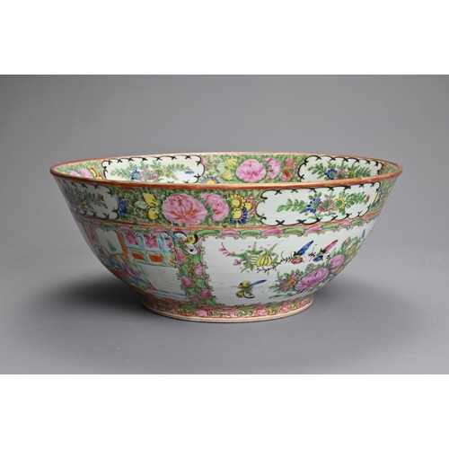 27 - A CHINESE CANTON FAMILLE ROSE PORCELAIN PUNCH BOWL, 19/20TH CENTURY. Rose medallion decorated with p... 