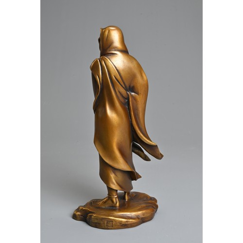 300 - A 20TH CENTURY JAPANESE GILT BRONZE FIGURE OF DARUMA AFTER KOUN TAKAMURA (1852-1934). Cast standing ... 