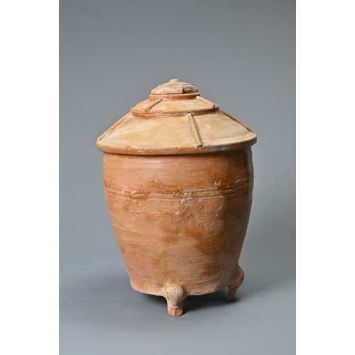 183 - A RARE LARGE CHINESE HAN DYNASTY GLAZED GRANARY JAR WITH COVER. Made from a red pottery and coated i... 