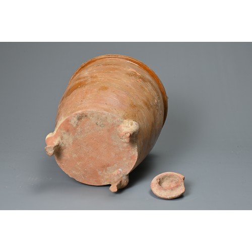 183 - A RARE LARGE CHINESE HAN DYNASTY GLAZED GRANARY JAR WITH COVER. Made from a red pottery and coated i... 