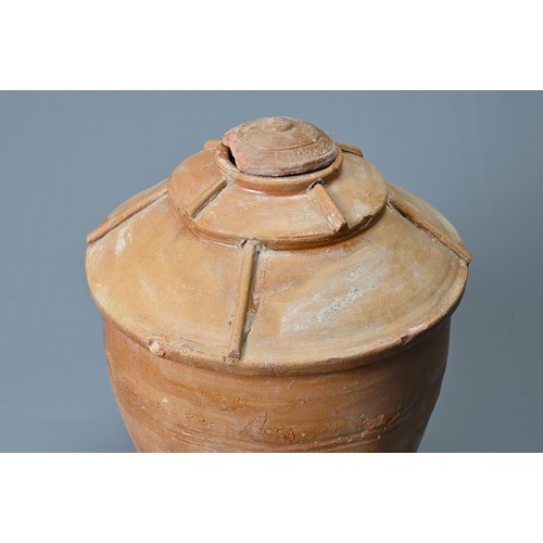 183 - A RARE LARGE CHINESE HAN DYNASTY GLAZED GRANARY JAR WITH COVER. Made from a red pottery and coated i... 