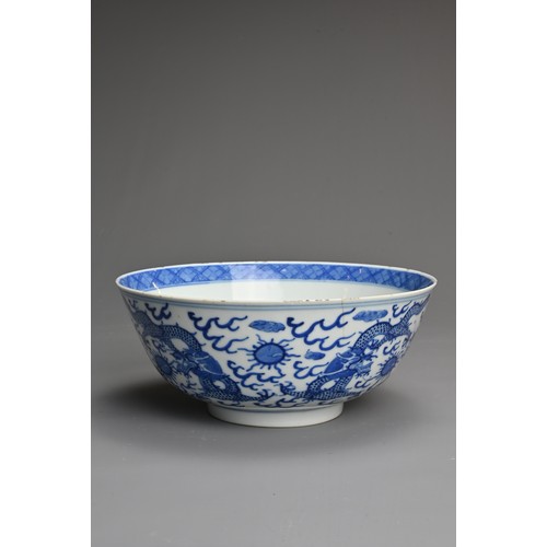 8 - A CHINESE BLUE AND WHITE PORCELAIN BOWL, 19TH CENTURY. Decorated to the exterior with five dragons c... 