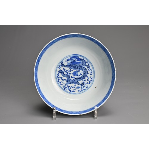 8 - A CHINESE BLUE AND WHITE PORCELAIN BOWL, 19TH CENTURY. Decorated to the exterior with five dragons c... 