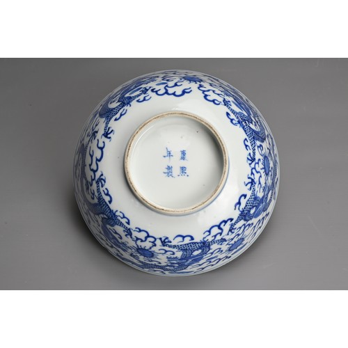 8 - A CHINESE BLUE AND WHITE PORCELAIN BOWL, 19TH CENTURY. Decorated to the exterior with five dragons c... 