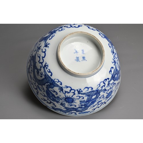 8 - A CHINESE BLUE AND WHITE PORCELAIN BOWL, 19TH CENTURY. Decorated to the exterior with five dragons c... 