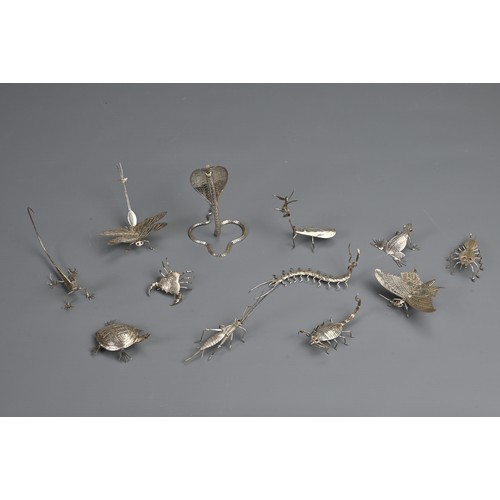 61 - A SET OF TWELVE INDIAN WHITE METAL INSECT AND REPTILE MENU HOLDERS, EARLY 20TH CENTURY. Each differe... 