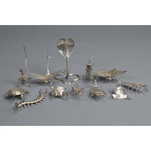 61 - A SET OF TWELVE INDIAN WHITE METAL INSECT AND REPTILE MENU HOLDERS, EARLY 20TH CENTURY. Each differe... 