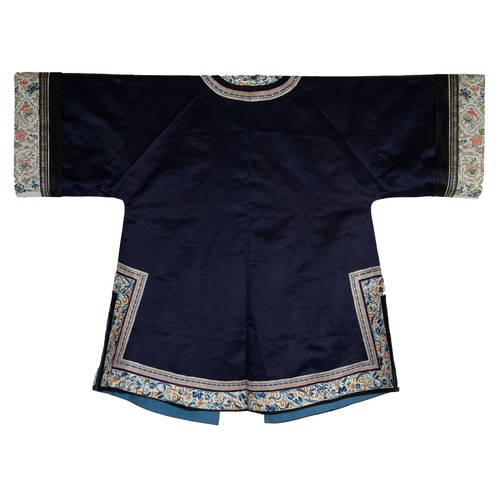 55 - TWO CHINESE EMBROIDERED SILK ROBES, CIRCA 1920 AND LATER. The first, early 20th century, in dark pur... 