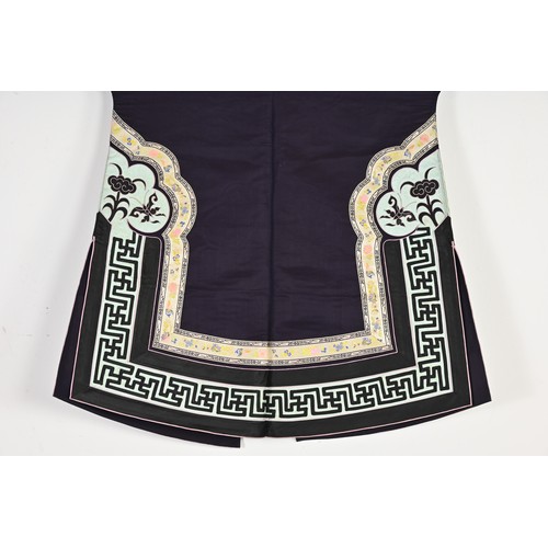 55 - TWO CHINESE EMBROIDERED SILK ROBES, CIRCA 1920 AND LATER. The first, early 20th century, in dark pur... 