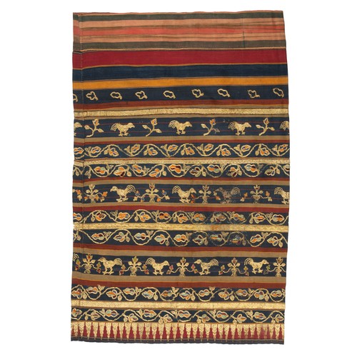 297 - AN INDONESIAN SUMATRAN LAMPUNG CEREMONIAL GOLD THREAD TAPIS SARONG, EARLY 20TH CENTURY. Embroidered ... 