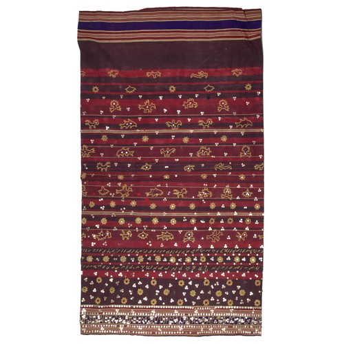 299 - AN INDONESIAN SUMATRAN LAMPUNG CEREMONIAL GOLD THREAD TAPIS SARONG, EARLY 20TH CENTURY. Embroidered ... 