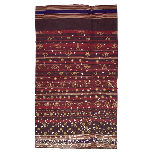 299 - AN INDONESIAN SUMATRAN LAMPUNG CEREMONIAL GOLD THREAD TAPIS SARONG, EARLY 20TH CENTURY. Embroidered ... 