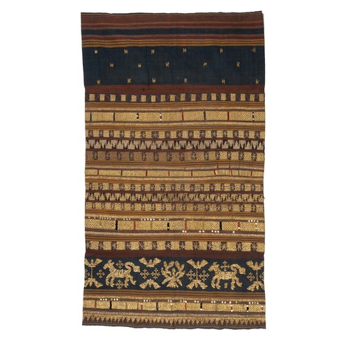 316 - AN INDONESIAN SUMATRAN LAMPUNG CEREMONIAL GOLD THREAD TAPIS SARONG, EARLY 20TH CENTURY. Embroidered ... 