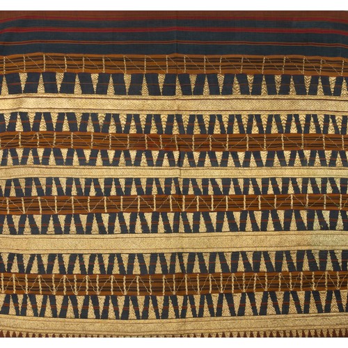 329 - THREE INDONESIAN SUMATRAN LAMPUNG GOLD THREAD CEREMONIAL TAPIS SARONGS, EARLY 20TH CENTURY. One embr... 