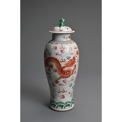 27 - A CHINESE FAMILLE ROSE PORCELAIN VASE AND COVER, EARLY 20TH CENTURY. Of baluster form decorated with... 