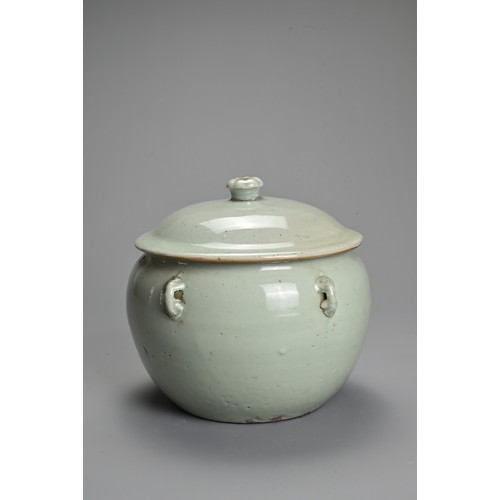 30 - A CHINESE PALE CELADON GLAZED PORCELAIN TUREEN AND COVER, 19TH CENTURY. Rounded pot with four handle... 