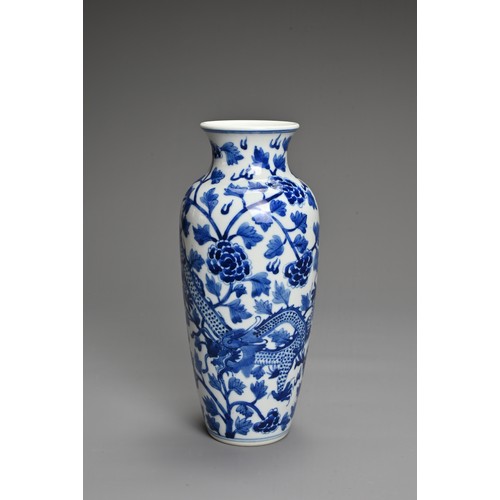 68 - A CHINESE BLUE AND WHITE PORCELAIN VASE. Decorated with a dragon and leafy peony scrolls with flat u... 