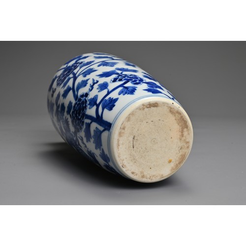 68 - A CHINESE BLUE AND WHITE PORCELAIN VASE. Decorated with a dragon and leafy peony scrolls with flat u... 