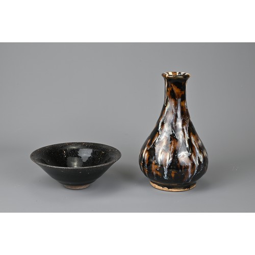 164 - TWO CHINESE CERAMIC ITEMS. To include a Cizhou type pear shaped bottle vase, covered in a black lust... 