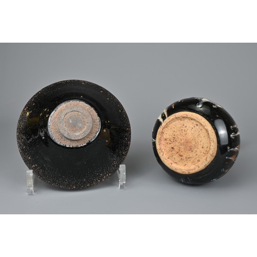 164 - TWO CHINESE CERAMIC ITEMS. To include a Cizhou type pear shaped bottle vase, covered in a black lust... 