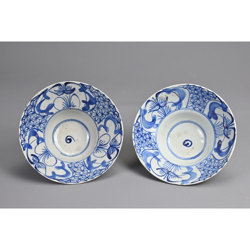 47 - A PAIR OF CHINESE BLUE AND WHITE PORCELAIN BOWLS, QING DYNASTY. Each with stylised floral decoration... 