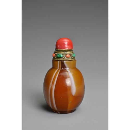 3 - A LARGE CHINESE GLASS IMITATION AGATE SNUFF BOTTLE. With globular body. With a metal stopper inlaid ... 