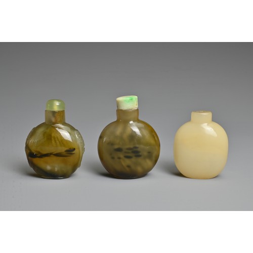 4 - THREE CHINESE GLASS IMITATION AGATE SNUFF BOTTLES. Each of flattened globular ovoid form, one with t... 