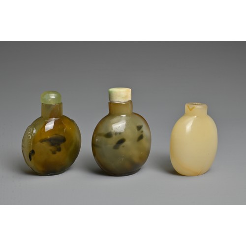 4 - THREE CHINESE GLASS IMITATION AGATE SNUFF BOTTLES. Each of flattened globular ovoid form, one with t... 