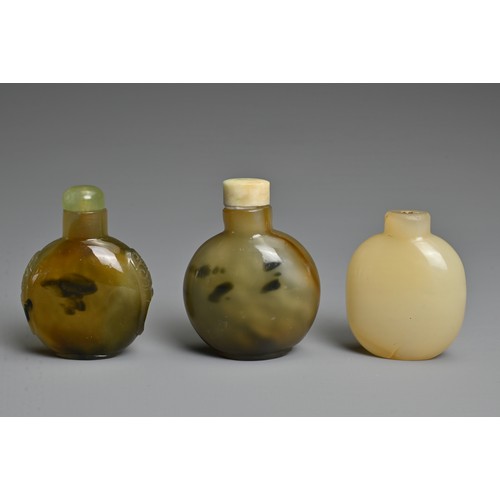 4 - THREE CHINESE GLASS IMITATION AGATE SNUFF BOTTLES. Each of flattened globular ovoid form, one with t... 