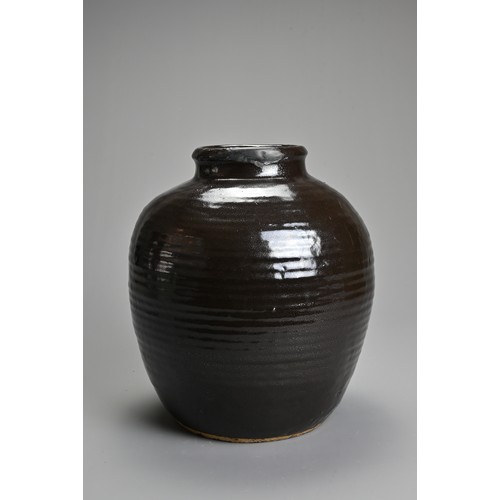 165 - A LARGE CHINESE CIZHOU TYPE OIL SPOT GLAZED JAR, 13/14TH CENTURY. An ovoid jar with rolled rim and h... 