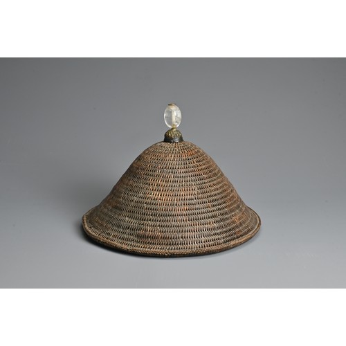 85 - A RARE CHINESE HARD RATTAN HAT WITH ROCK CRYSTAL FINIAL, QING DYNASTY. Heavy woven rattan hat of con... 