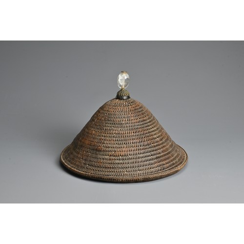 85 - A RARE CHINESE HARD RATTAN HAT WITH ROCK CRYSTAL FINIAL, QING DYNASTY. Heavy woven rattan hat of con... 