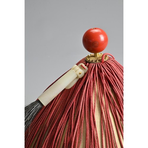 86 - A CHINESE MANDARIN OFFICIALS SUMMER HAT WITH WHITE JADE PLUME AND RED FINIAL, QING DYNASTY. A bamboo... 