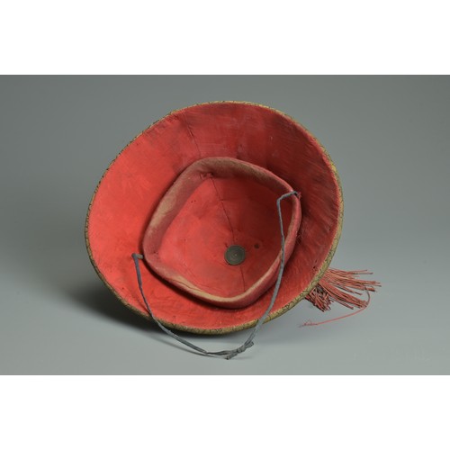 87 - A CHINESE MANDARIN SUMMER COURT HAT WITH CORAL FINIAL, QING DYNASTY. Of conical form with woven bamb... 