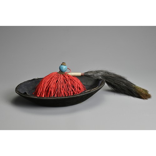 88 - A CHINESE MANDARIN WINTER COURT HAT WITH BLUE GLASS FINAL, QING DYNASTY. Covered in a black velvet w... 