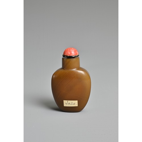 10 - A CHINESE AGATE STONE SNUFF BOTTLE. Of flattened ovoid form carved in relief with peony spray. With ... 