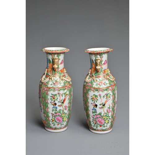 20 - A PAIR OF CHINESE CANTON FAMILLE ROSE PORCELAIN VASES, 19TH CENTURY. Rose Medallion decoration of fi... 